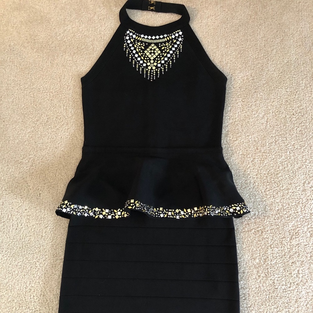 Bebe black peplum mini dress size M